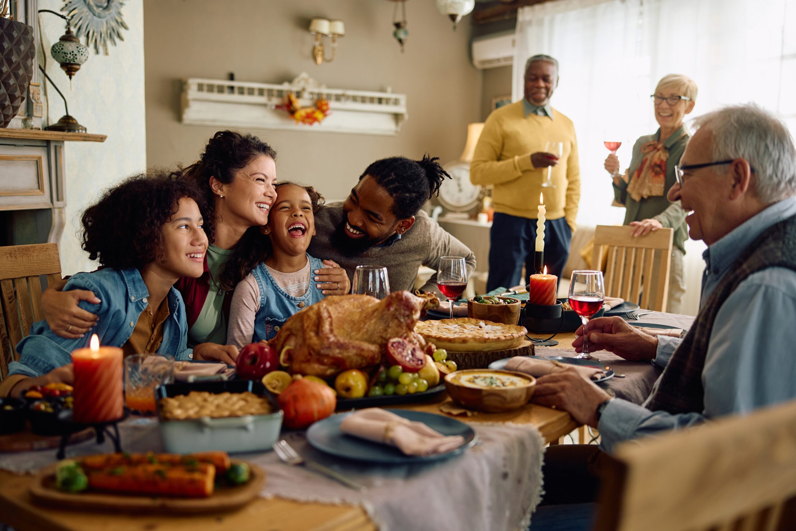 Family gathered for Thanksgiving meal.